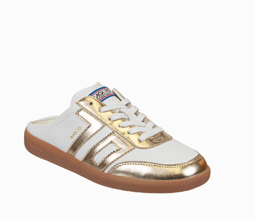 Back 70 EASTER METALLIC GOLD BACKLESS SNEAKER Shoes | Shop now at Main & Taylor Shoes!