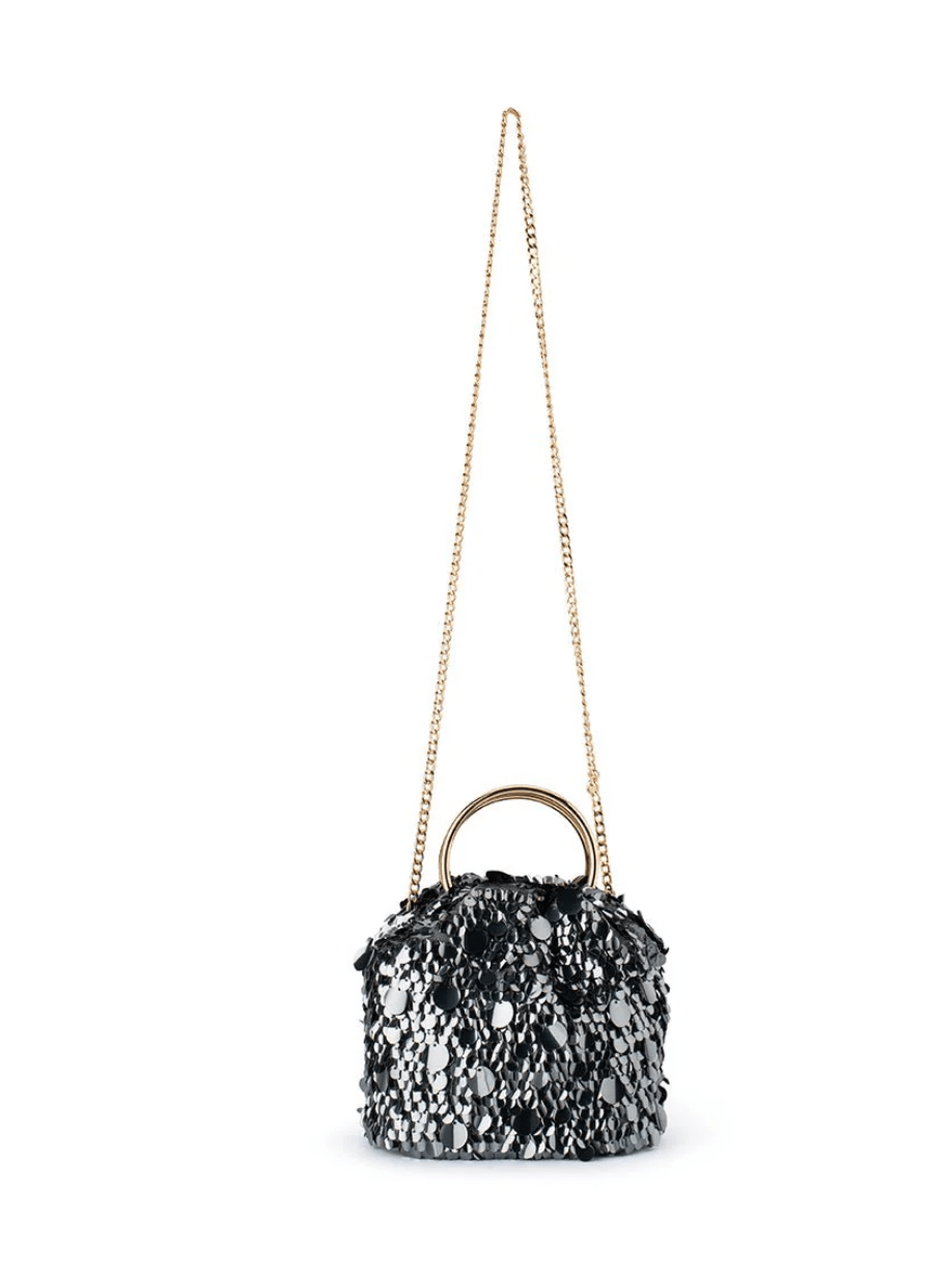 Olga Berg VERA SEQUIN GUNMETAL WRISTLET HANDBAGS | Shop now at Main &amp; Taylor Shoes!