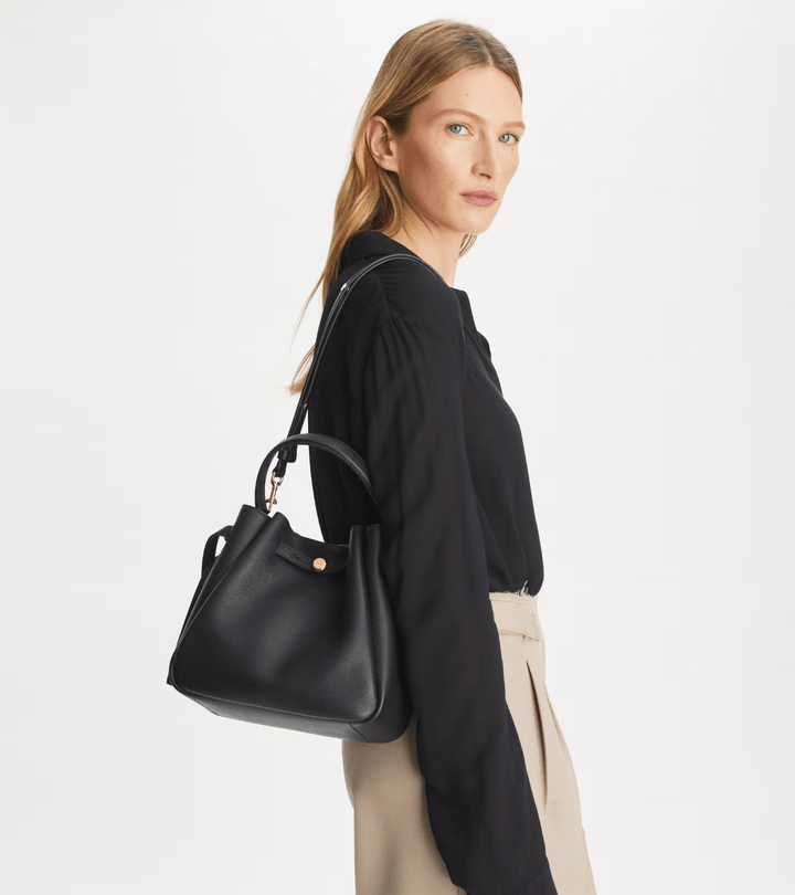 TORY BURCH HANDBAGS ROMY BUCKET BAG BLACK HANDBAGS | Shop now at Main &amp; Taylor Shoes!