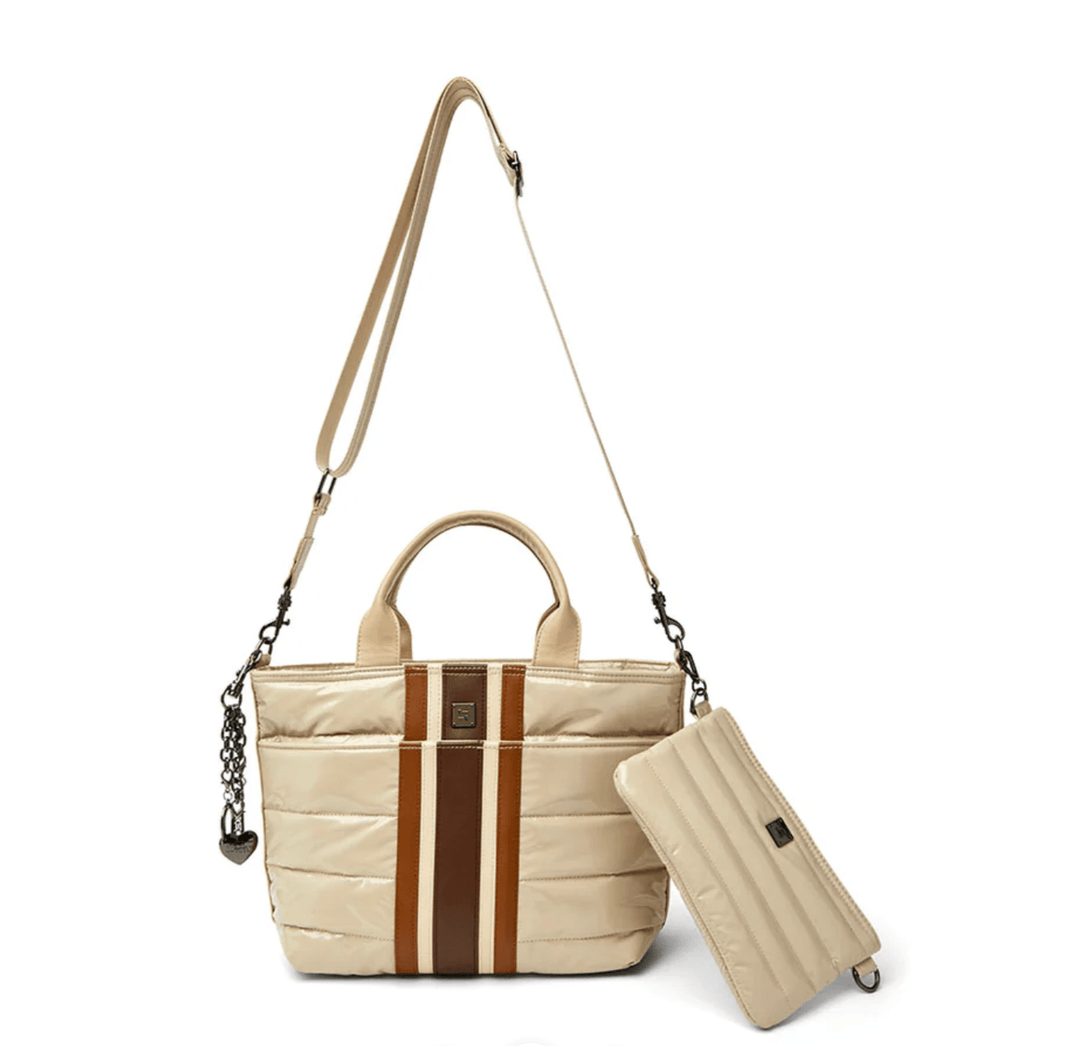 Think Roylin GETAWAY BLONDE PATENT TOTE Handbags | Shop now at Main &amp; Taylor Shoes!