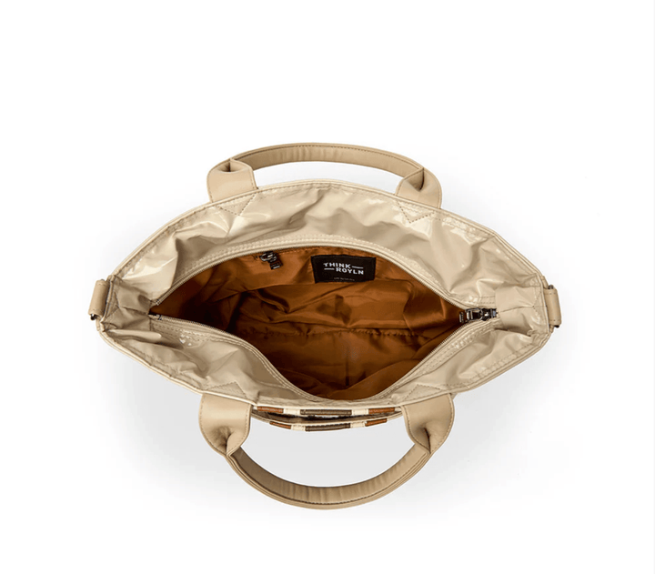 Think Roylin GETAWAY BLONDE PATENT TOTE Handbags | Shop now at Main &amp; Taylor Shoes!
