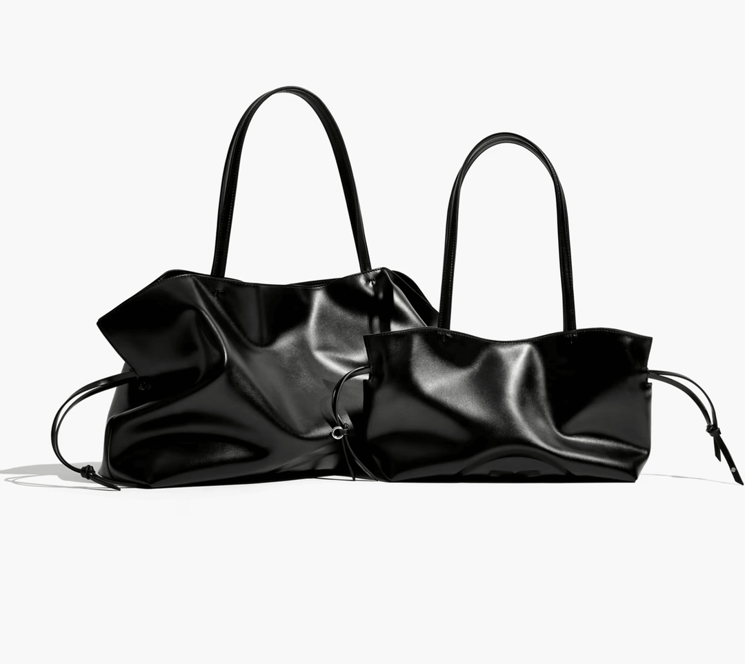 Tory Burch Handbag ELLA RECYCLED DRAWSTRING TOTE SMALL BLACK Handbags | Shop now at Main &amp; Taylor Shoes!